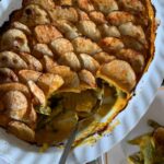cheesy green bean casserole with crispy potatoes
