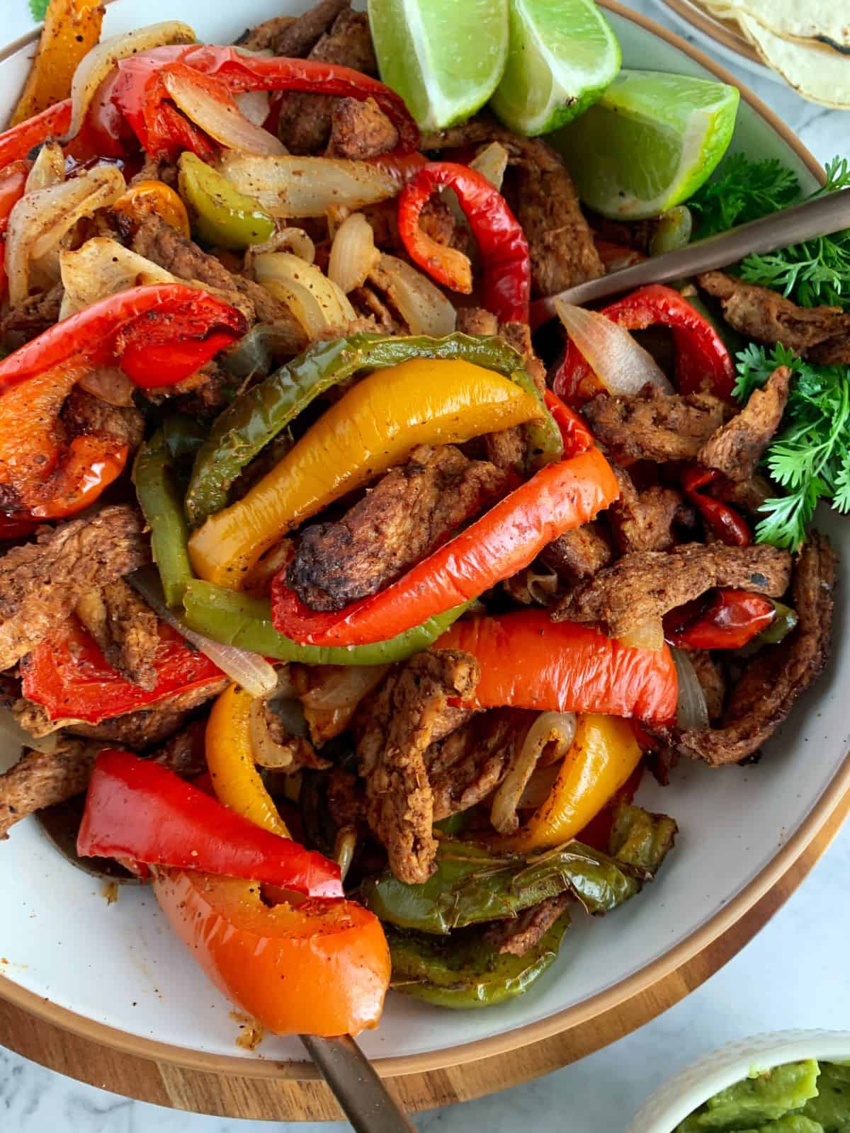 air fryer fajitas close up image of peppers, onions and soy curls