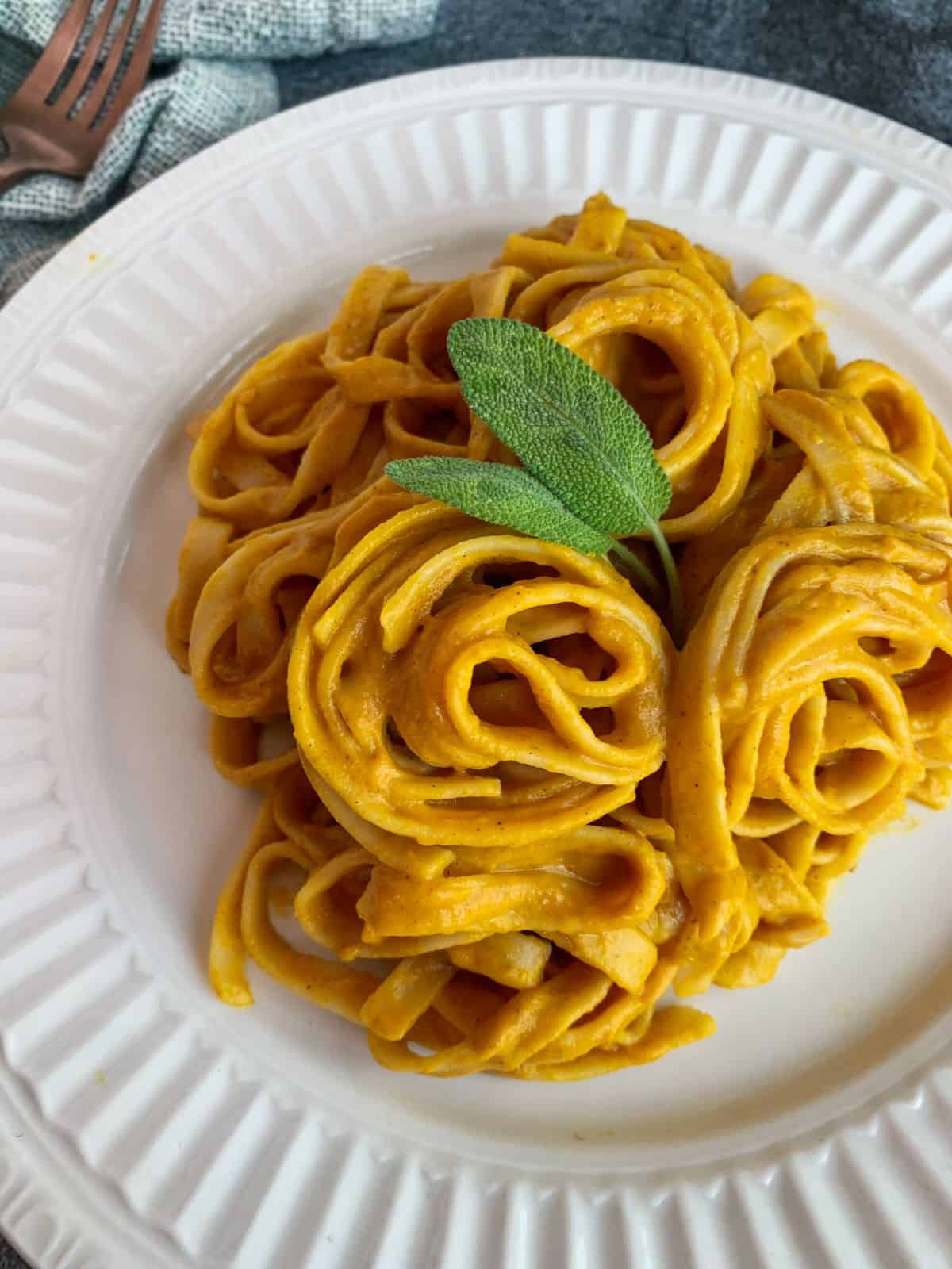 Close image of easy vegan pumpkin pasta with sage.