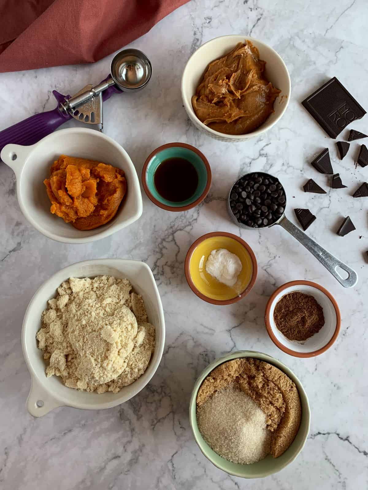 Ingredients laid out for pumpkin spice chocolate chip cookies