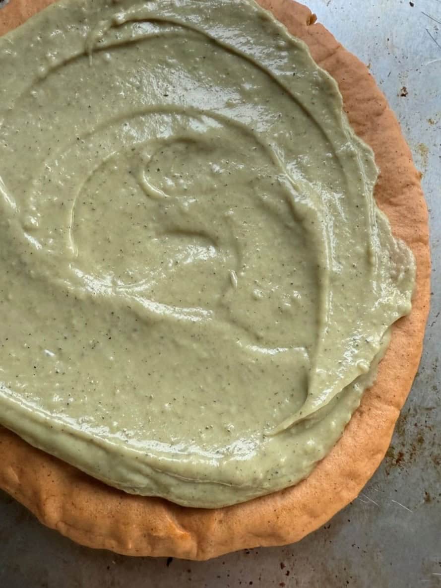Vegan white pizza sauce thickened on lentil pizza crust