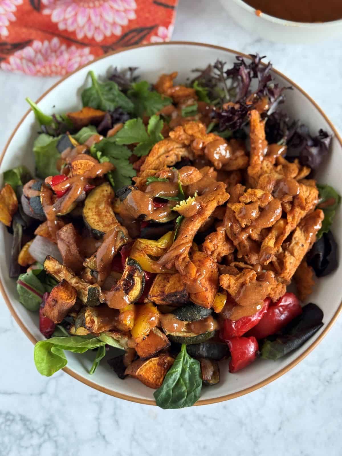 bbq soy curl bowl with oil free roasted vegetables and creamy smoky bbq sauce