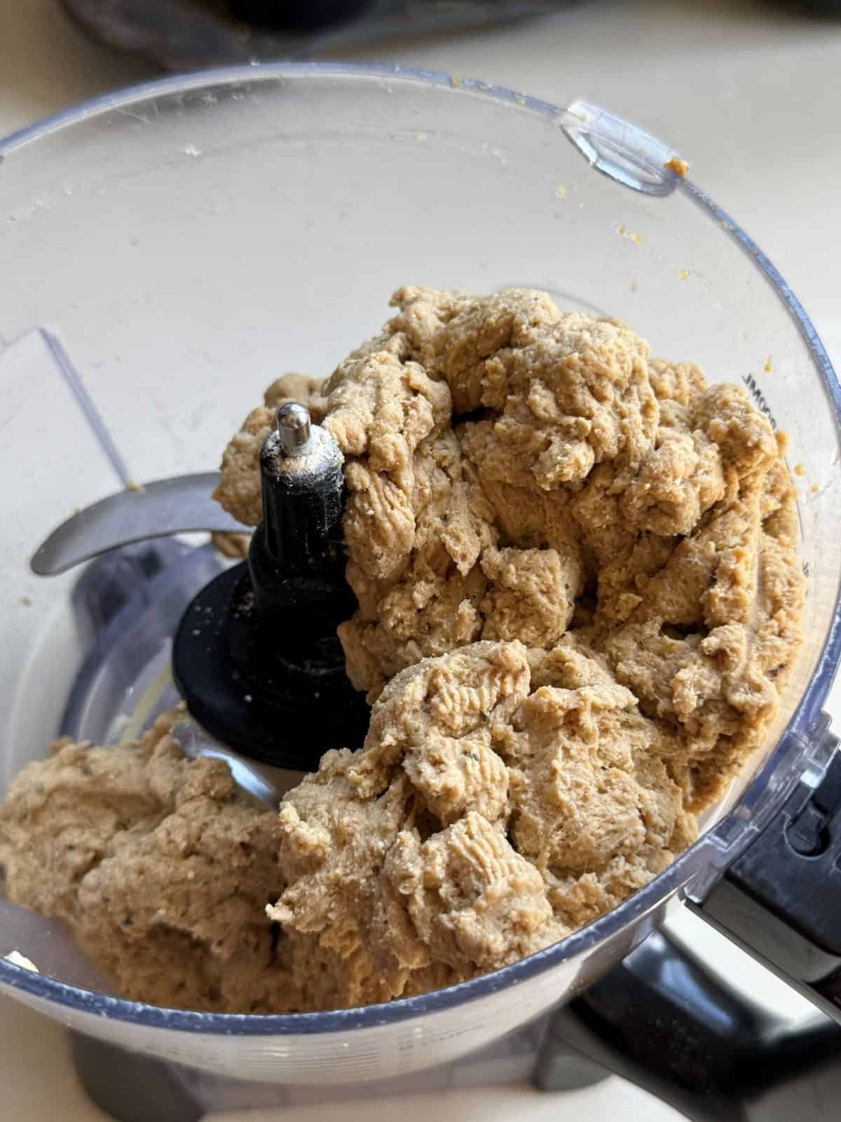 Vegan lunch meat dough in the food processor, ready to be shaped and steamed.