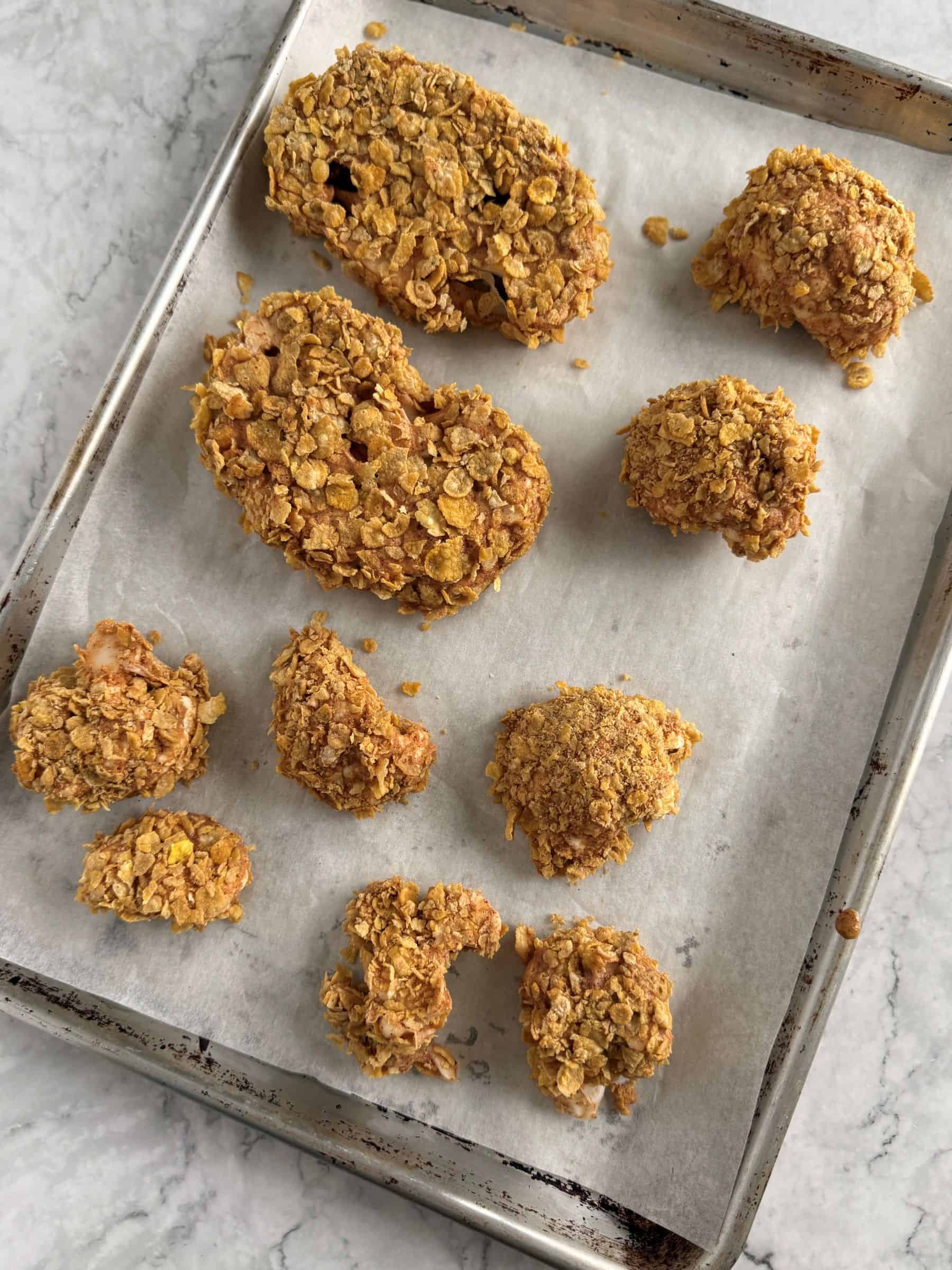 crispy cauliflower on lined baking sheet before the glaze