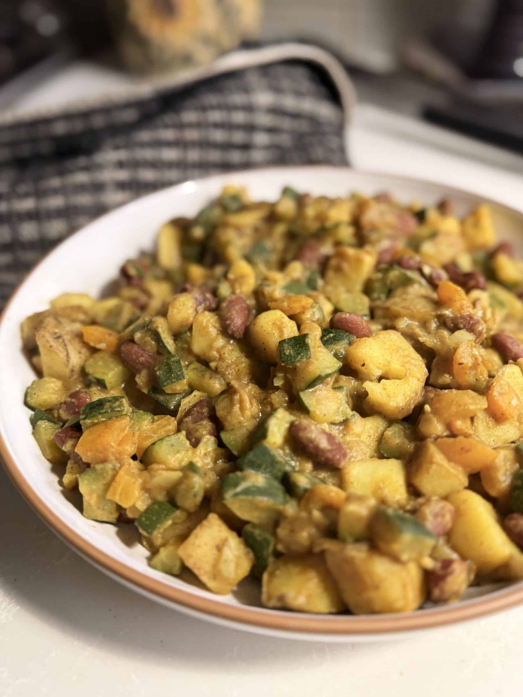 vegan potato breakfast scramble with veggies and beans