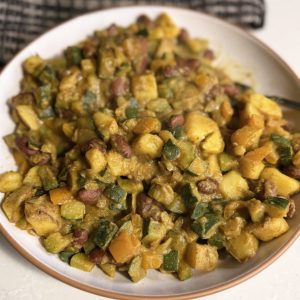vegan potato breakfast scramble with veggies and beans