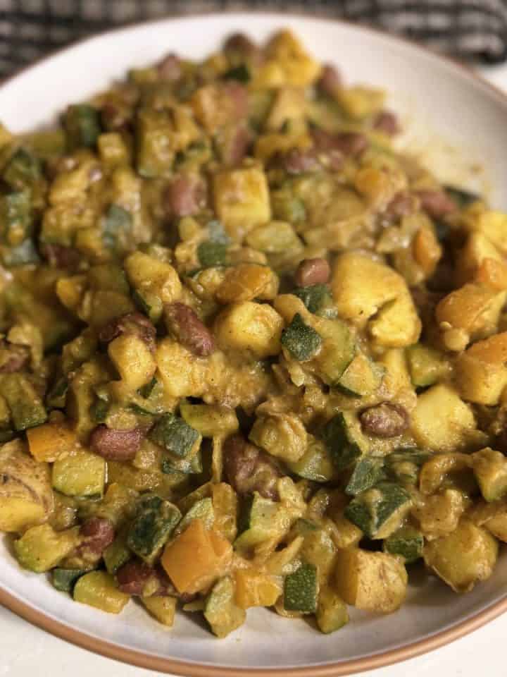 vegan potato breakfast scramble with veggies and beans