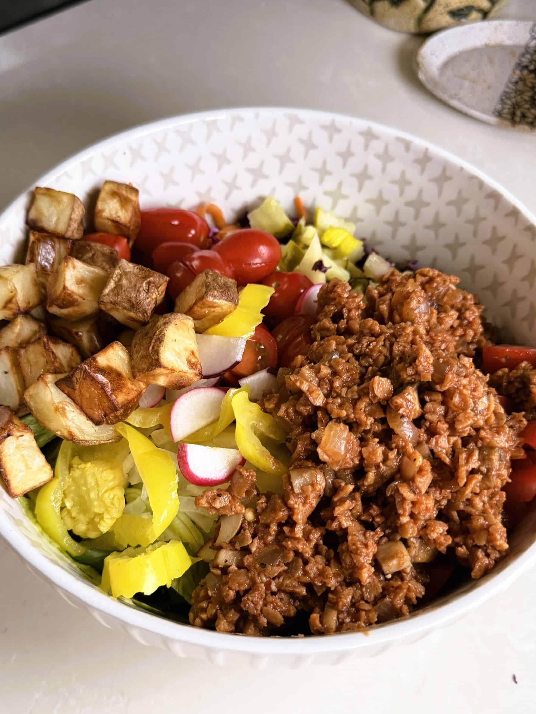 Healthy Vegan Ground meat made of tvp and mushrooms on a salad
